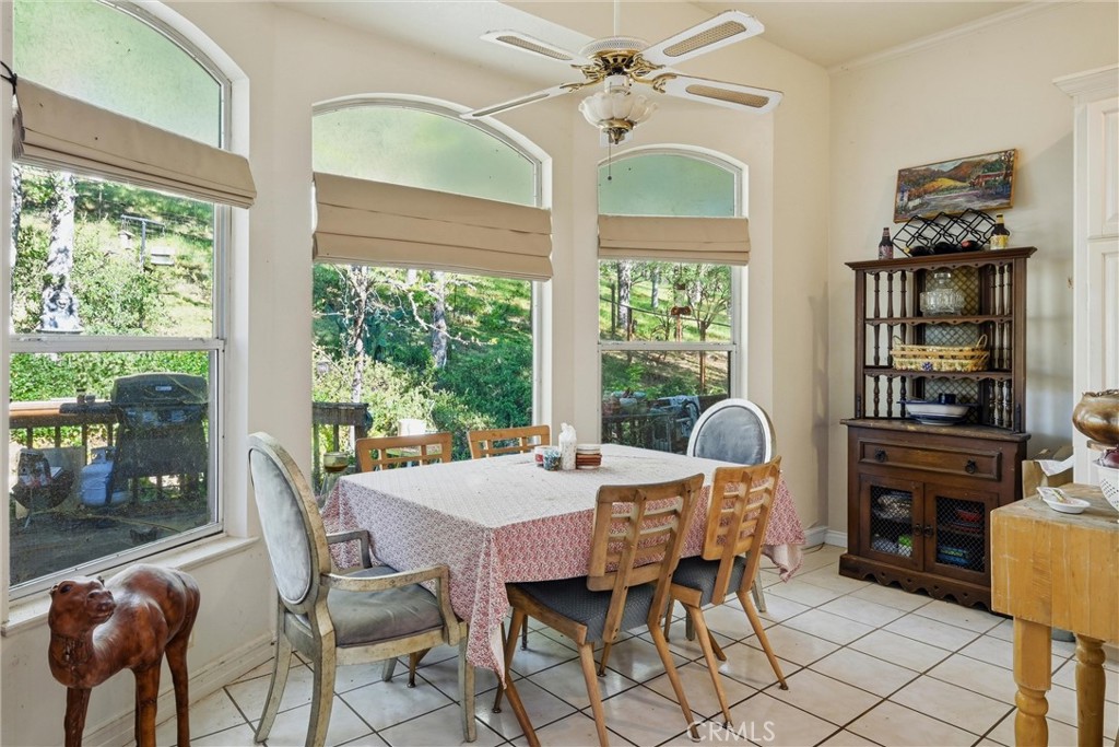 19552 Powder Horn Road Hidden Valley Lake, CA 95467 - Photo 10 of 30 a dining room with furniture window and outside view