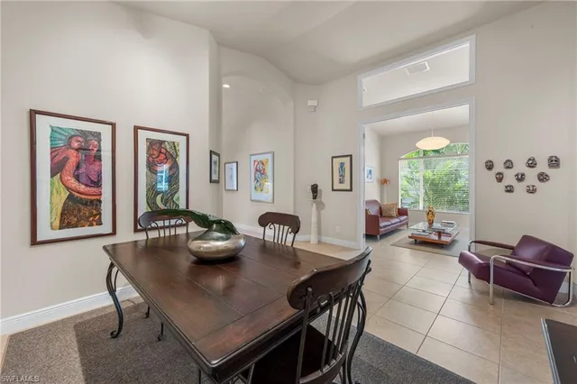a kitchen with granite countertop stainless steel appliances a stove sink and microwave