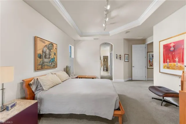 an aerial view of residential houses with outdoor space and river