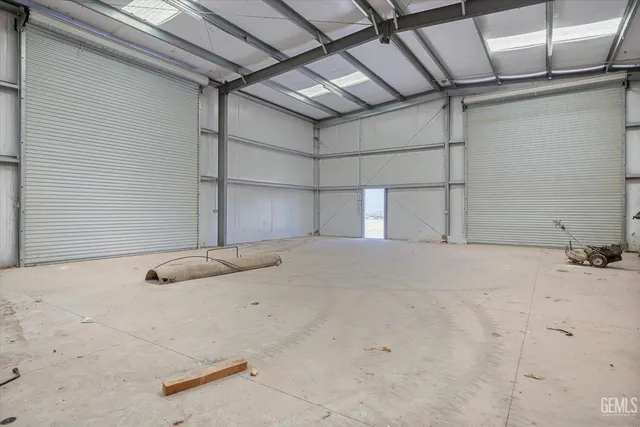 a view of a backyard of the house