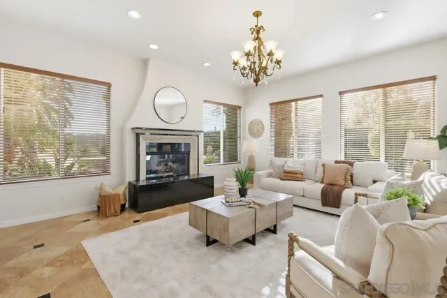 a spacious bedroom with a large bed and a window