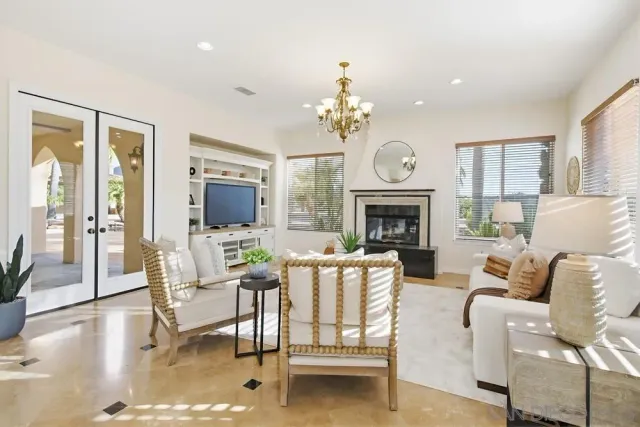 a spacious bathroom with a tub sink and mirror