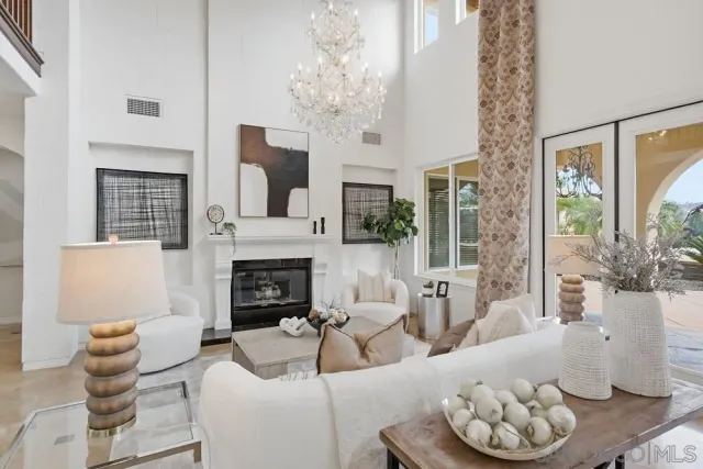 a spacious bedroom with a large bed and a window