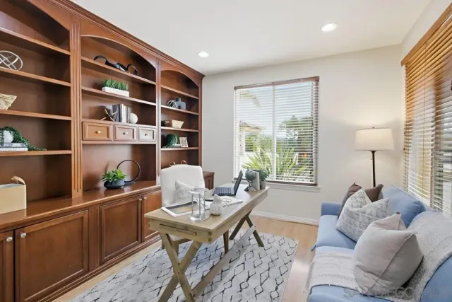 a bathroom with a sink a toilet and shower curtain