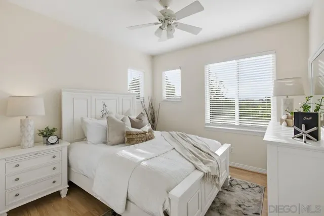 a kitchen with stainless steel appliances a refrigerator sink and cabinets