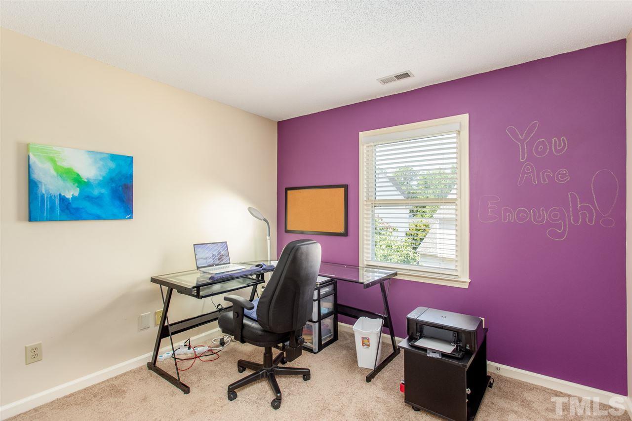 2300 Declaration Drive Raleigh, NC 27615 - Photo 18 of 30 a view of a workspace with furniture and a window
