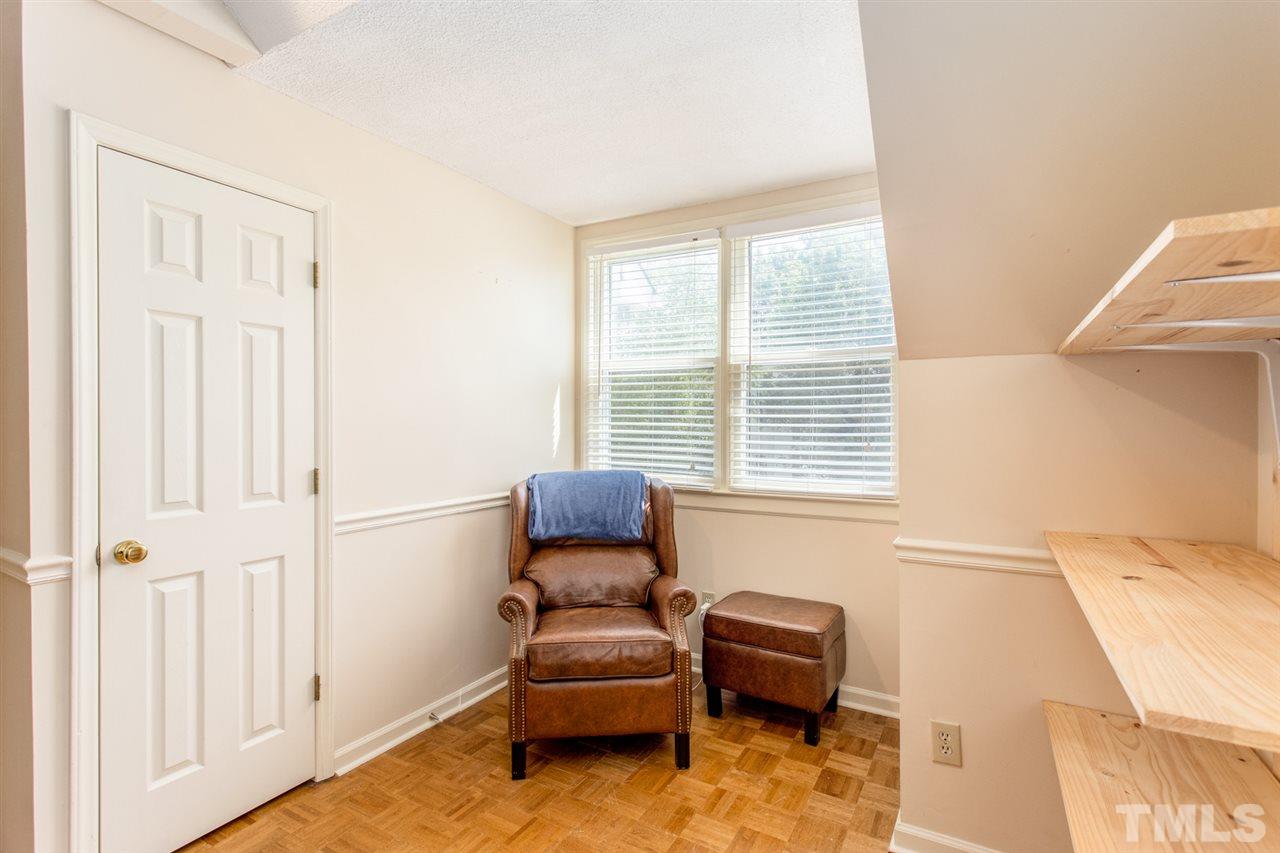 2300 Declaration Drive Raleigh, NC 27615 - Photo 22 of 30 a living room with furniture and a window