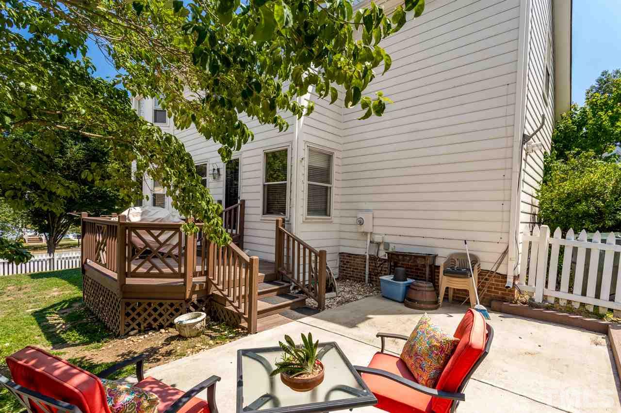 2300 Declaration Drive Raleigh, NC 27615 - Photo 26 of 30 a view of a patio with chairs and potted plants