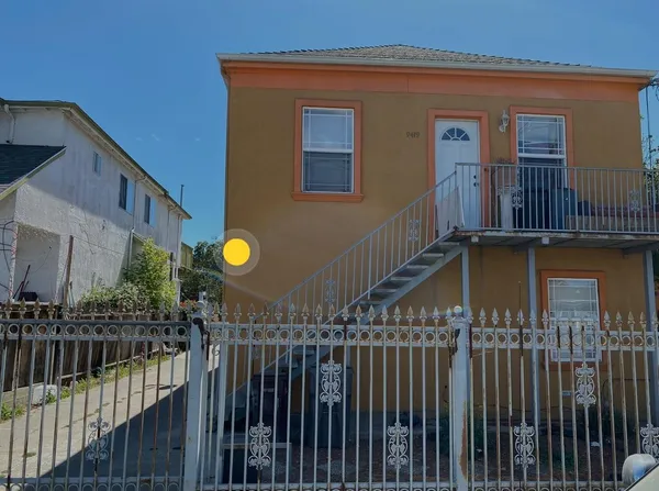 a view of a house with a street