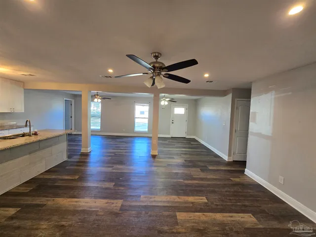 a view of an empty room and window