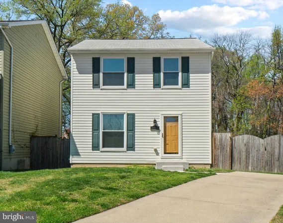 a room with cabinets and stainless steel appliances