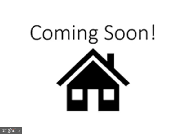 a room with furniture a wooden floor and furniture