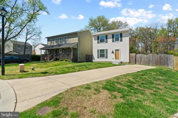 a view of work space with furniture and wooden floor