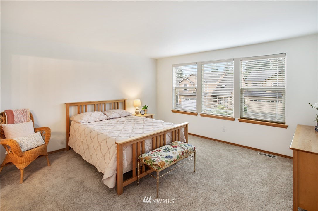 27 167th Place Southwest Bothell, WA 98012 - Photo 13 of 25 a bedroom with a bed and window