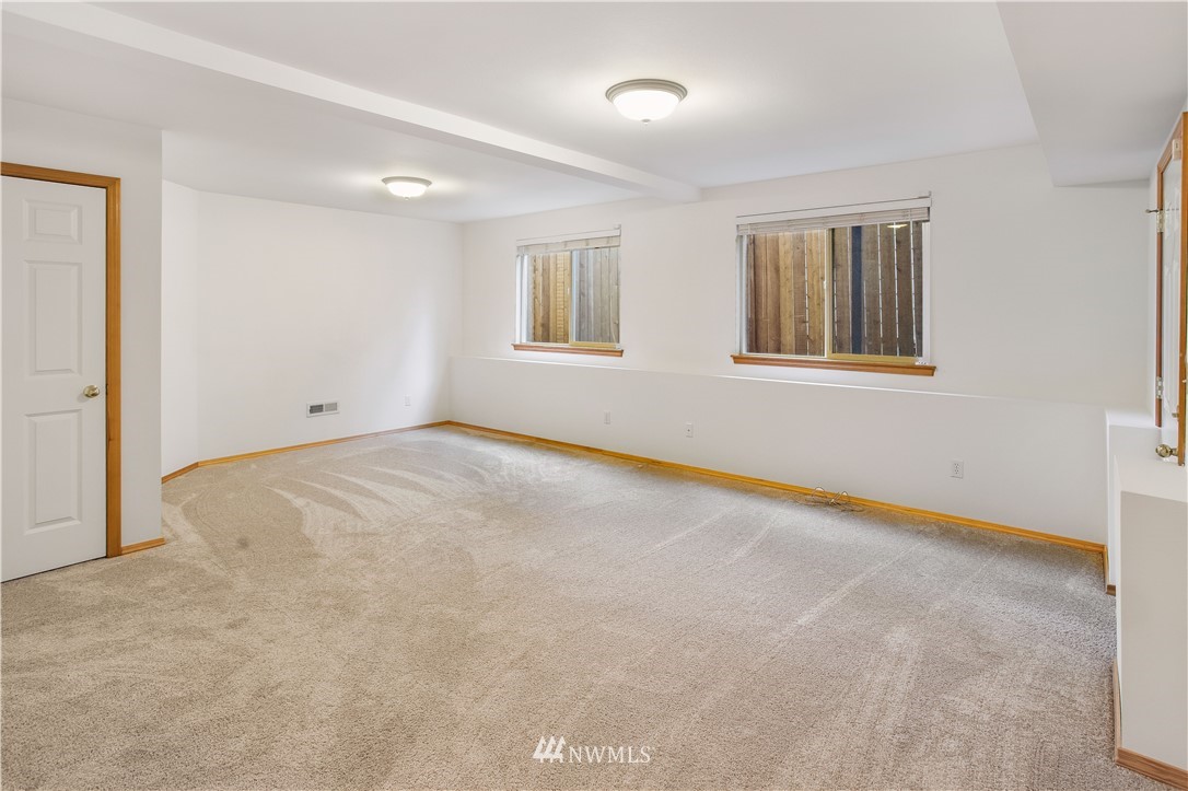 27 167th Place Southwest Bothell, WA 98012 - Photo 17 of 25 a view of an empty room with a window