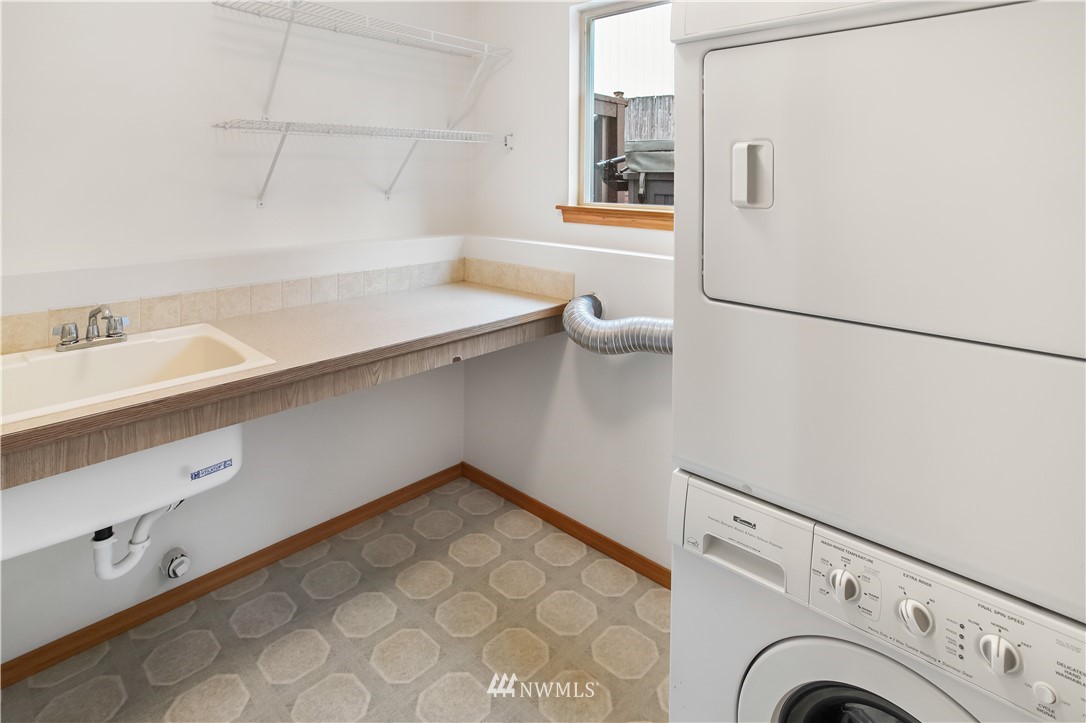 27 167th Place Southwest Bothell, WA 98012 - Photo 18 of 25 a view of storage and utility room with washer and dryer
