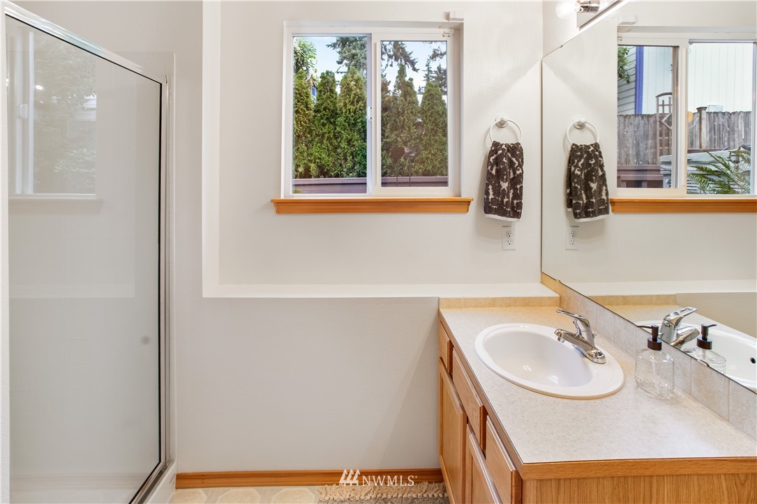 27 167th Place Southwest Bothell, WA 98012 - Photo 19 of 25 a bathroom with a sink and a window