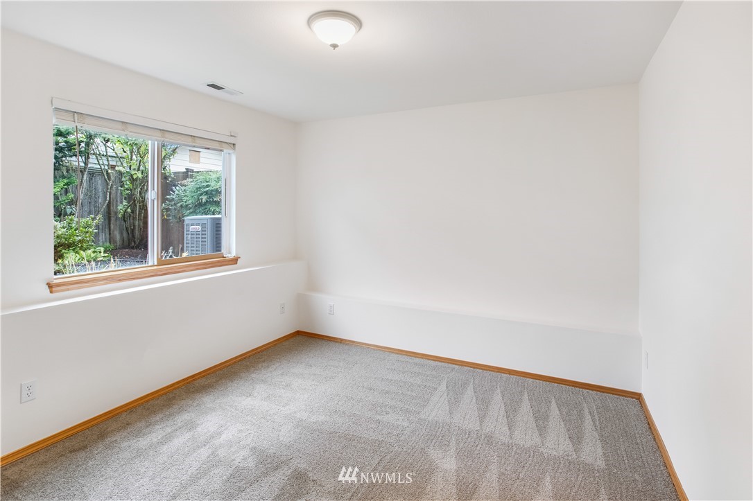 27 167th Place Southwest Bothell, WA 98012 - Photo 20 of 25 an empty room with a window