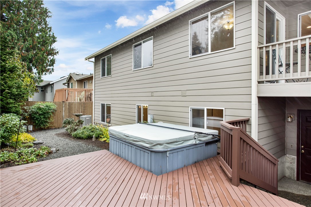 27 167th Place Southwest Bothell, WA 98012 - Photo 21 of 25 a view of a wooden deck with a yard