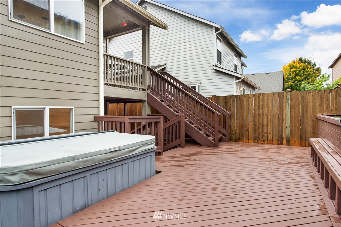27 167th Place Southwest Bothell, WA 98012 - Photo 22 of 25 a view of a house with wooden deck