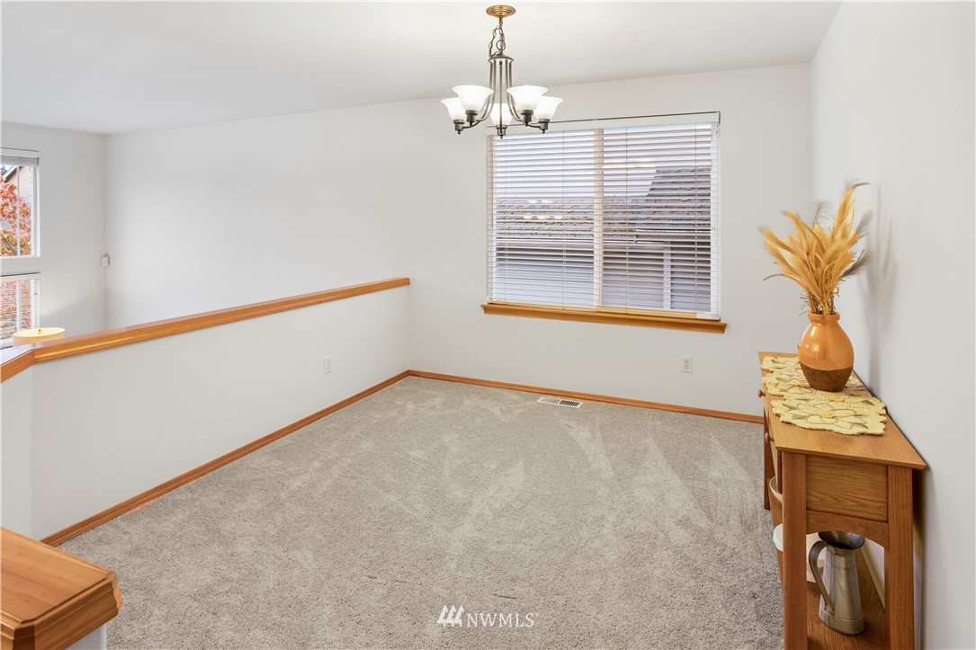 27 167th Place Southwest Bothell, WA 98012 - Photo 4 of 25 a view of an empty room with a window