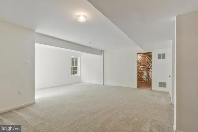 an empty room with window