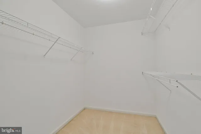 a view of a room with racks on the wall