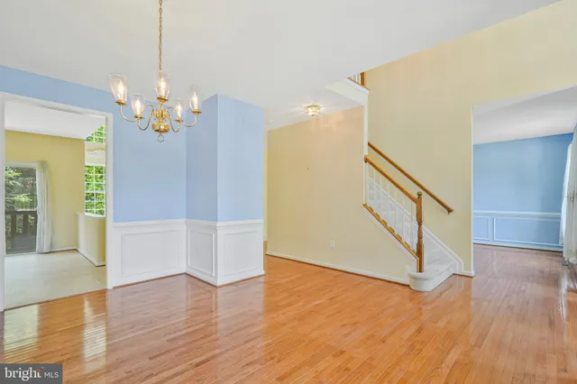 a view of a livingroom with wooden floor