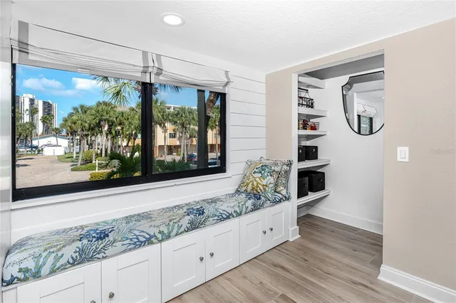 a view of a entryway door and hallway