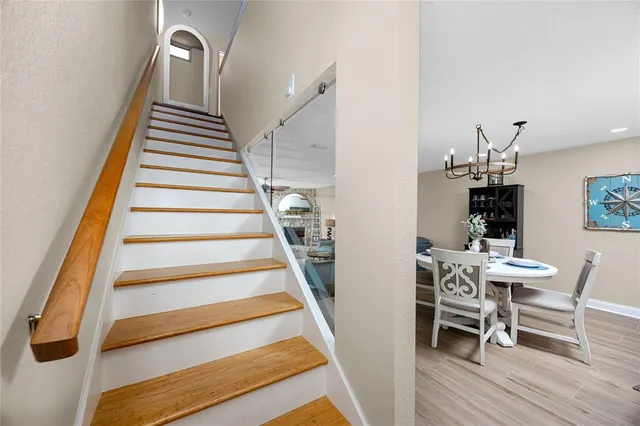 a spacious bedroom with a large bed and a window