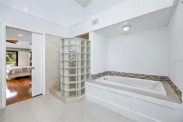 a utility room with closet dryer and washer