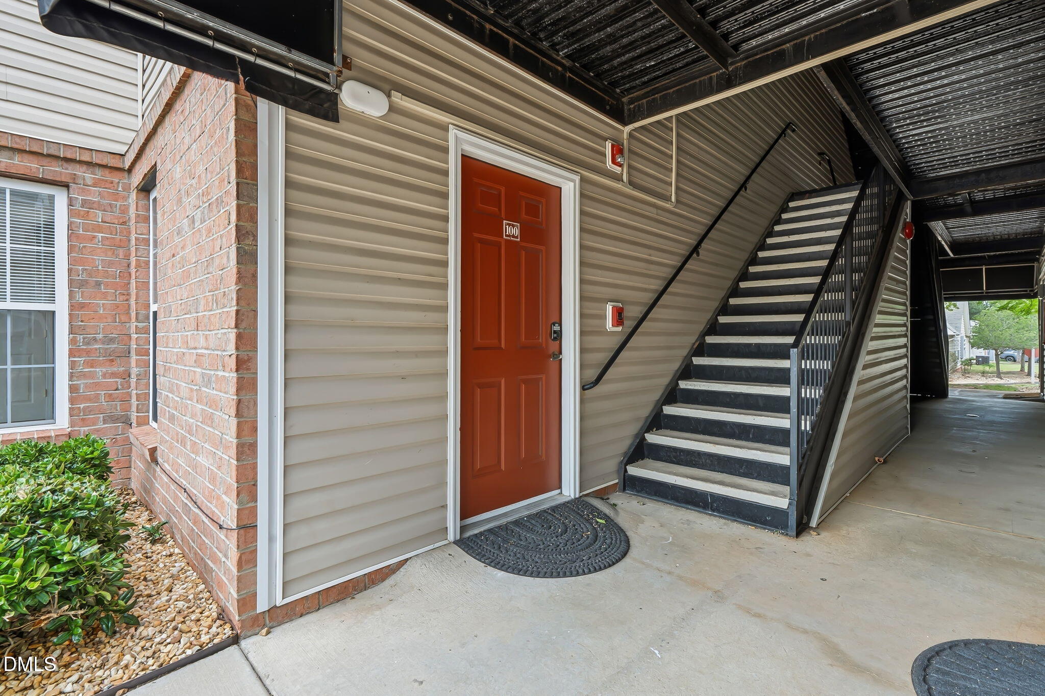 2501 Huntscroft Lane, Unit 100 Raleigh, NC 27617 - Photo 8 of 31 a view of a entryway door of a house