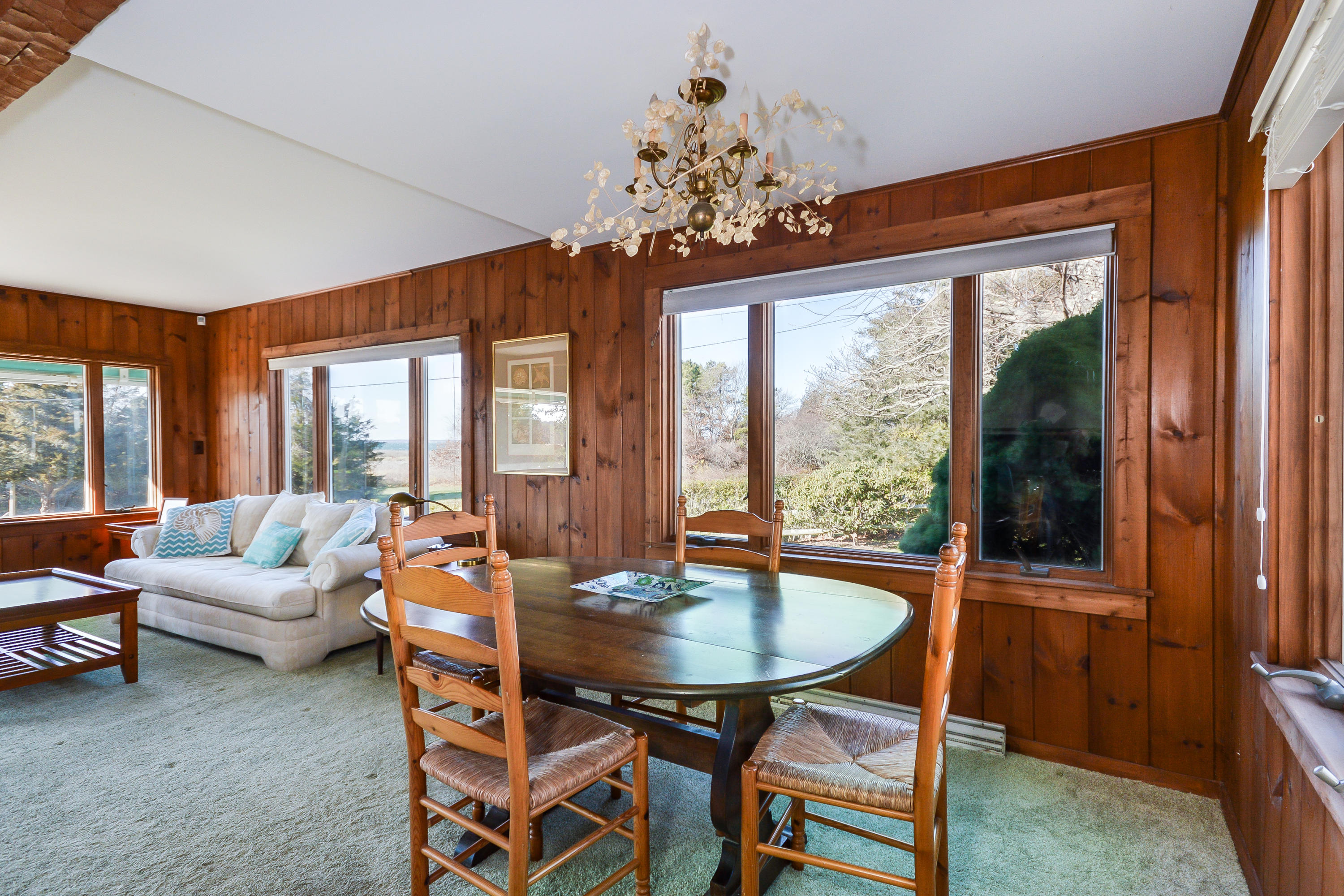 171 Bay Road North Falmouth, MA 02556 - Photo 11 of 24 a dining room with furniture a livingroom view and large windows