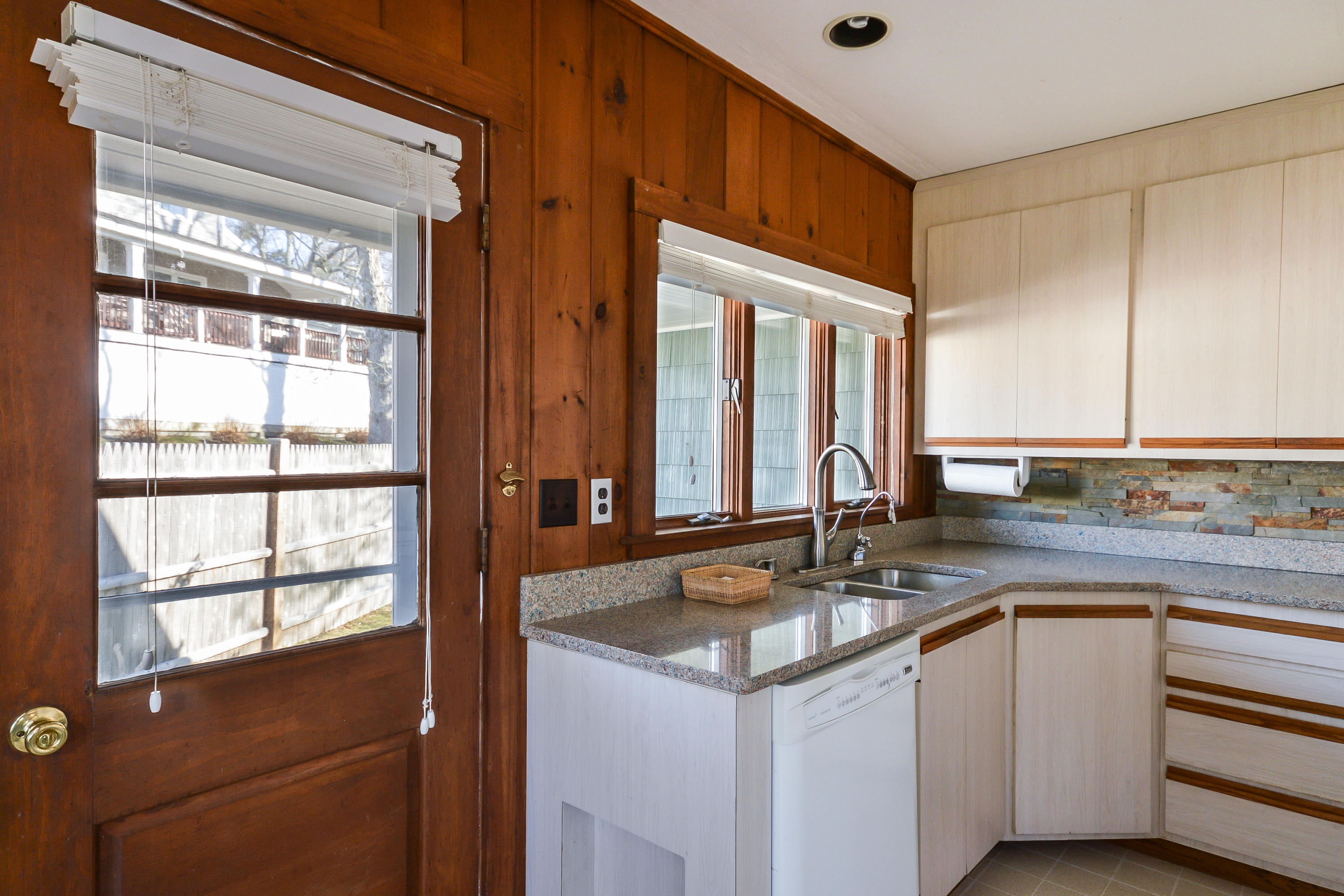 171 Bay Road North Falmouth, MA 02556 - Photo 13 of 24 a kitchen with a sink and cabinets