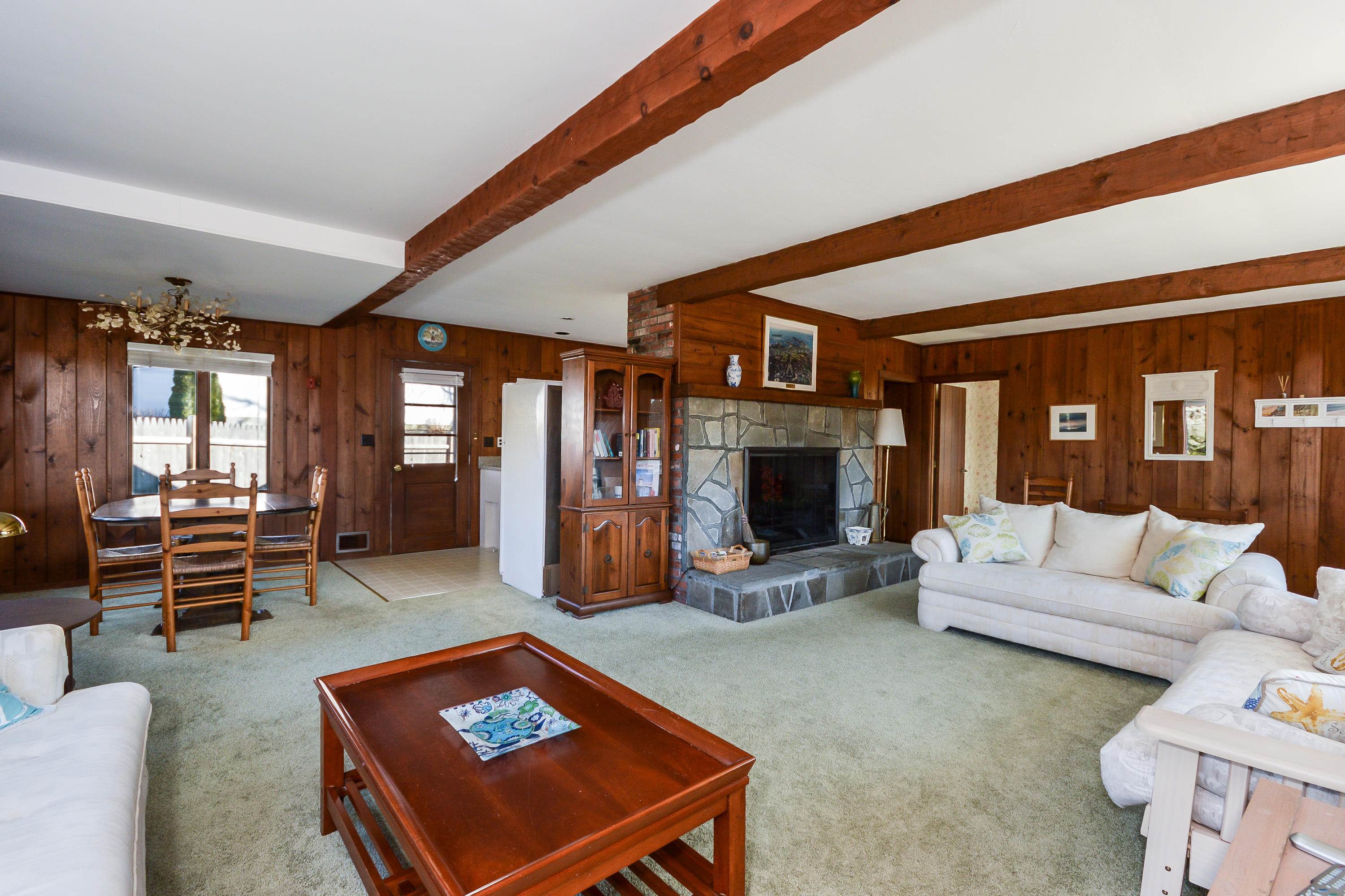 171 Bay Road North Falmouth, MA 02556 - Photo 10 of 24 a living room with furniture and a fireplace