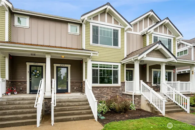 front view of a house with a yard