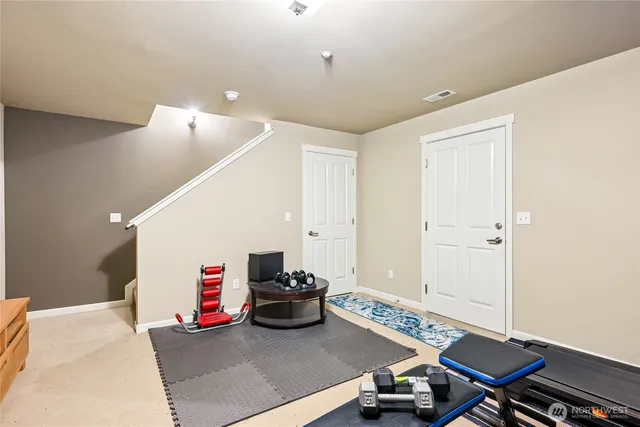 a living room with furniture and a table
