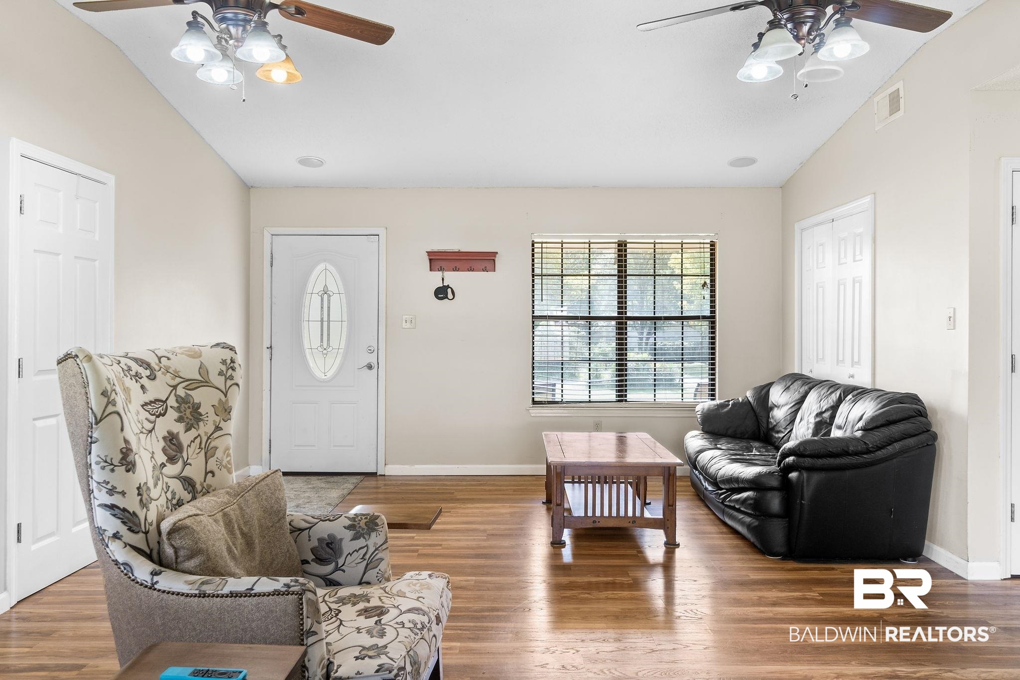 33135 Collier Road Lillian, AL 36549 - Photo 7 of 30 Foyer featuring ceiling fan, lofted ceiling, and wood finished floors
