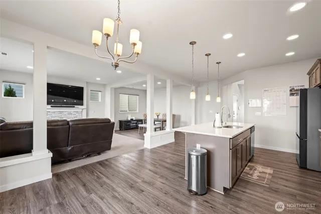 a view of a kitchen and dining room