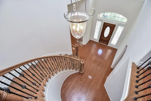 a view of staircase with washer and dryer
