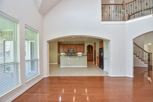 a view of a hallway with a living room