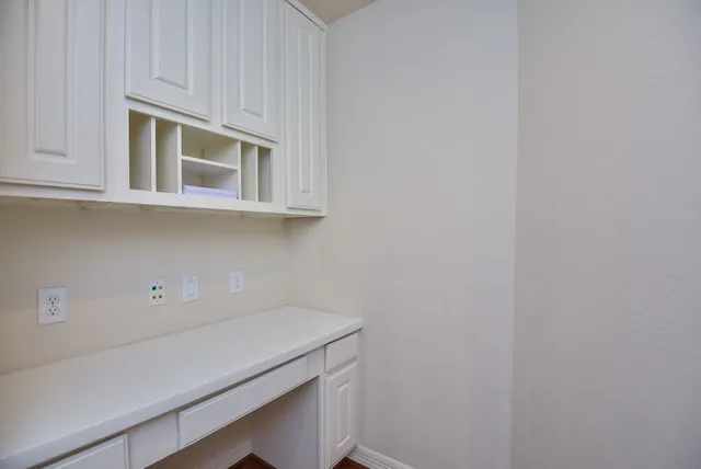 a utility room with a sink