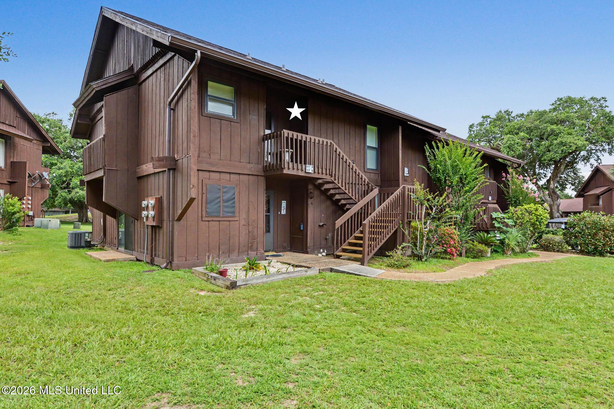 207 Molokai, Unit B Diamondhead, MS 39525 - Photo 2 of 39 002