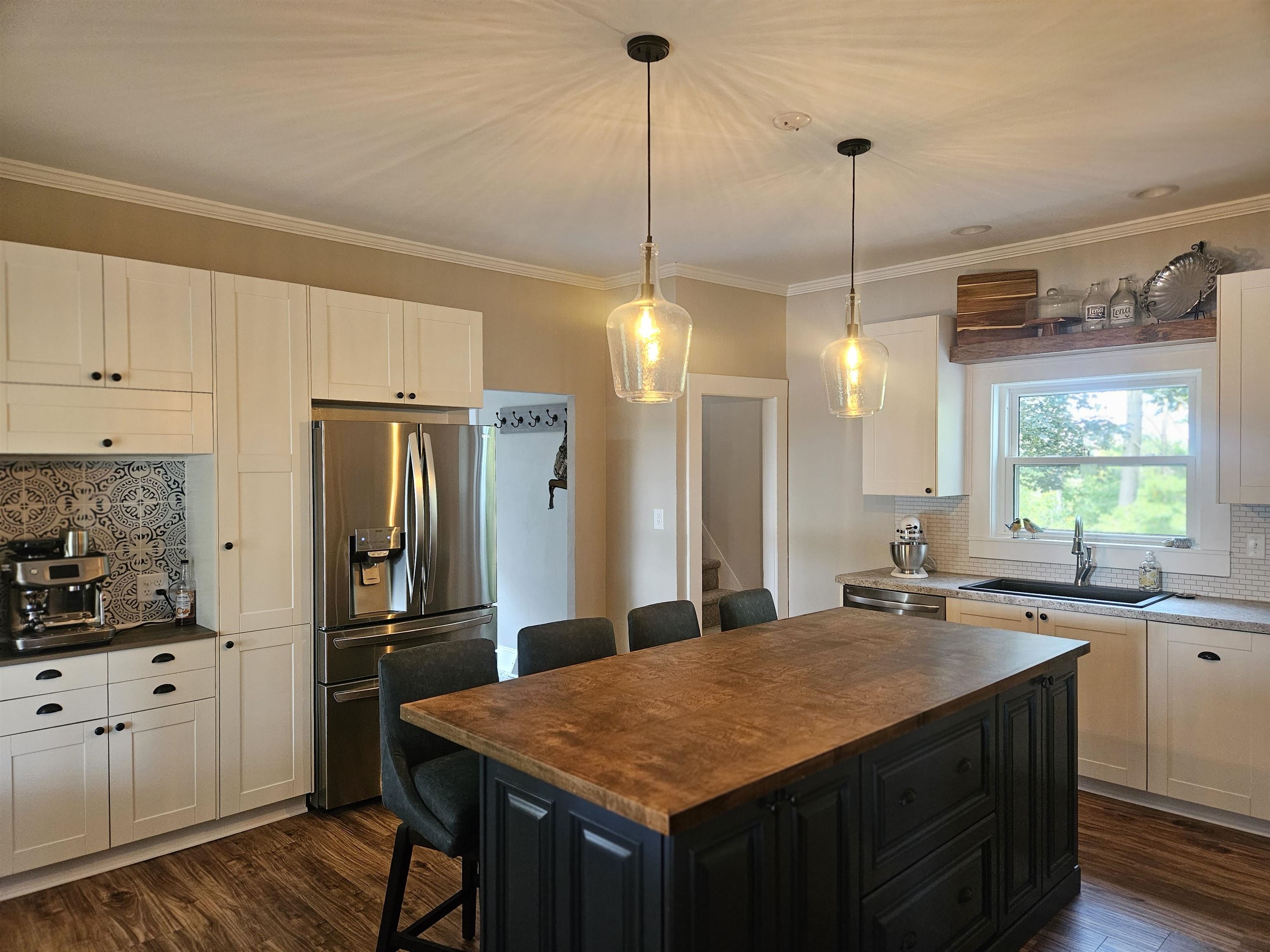 1851 West Winneshiek Road Freeport, IL 61032 - Photo 16 of 41 a kitchen with refrigerator and sink
