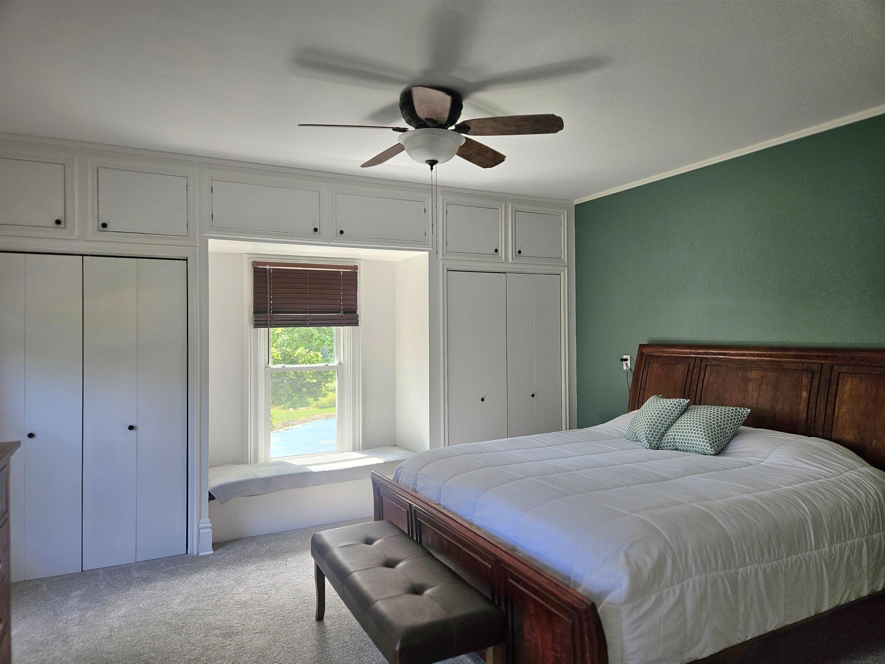 1851 West Winneshiek Road Freeport, IL 61032 - Photo 17 of 41 a bedroom with a bed and a window