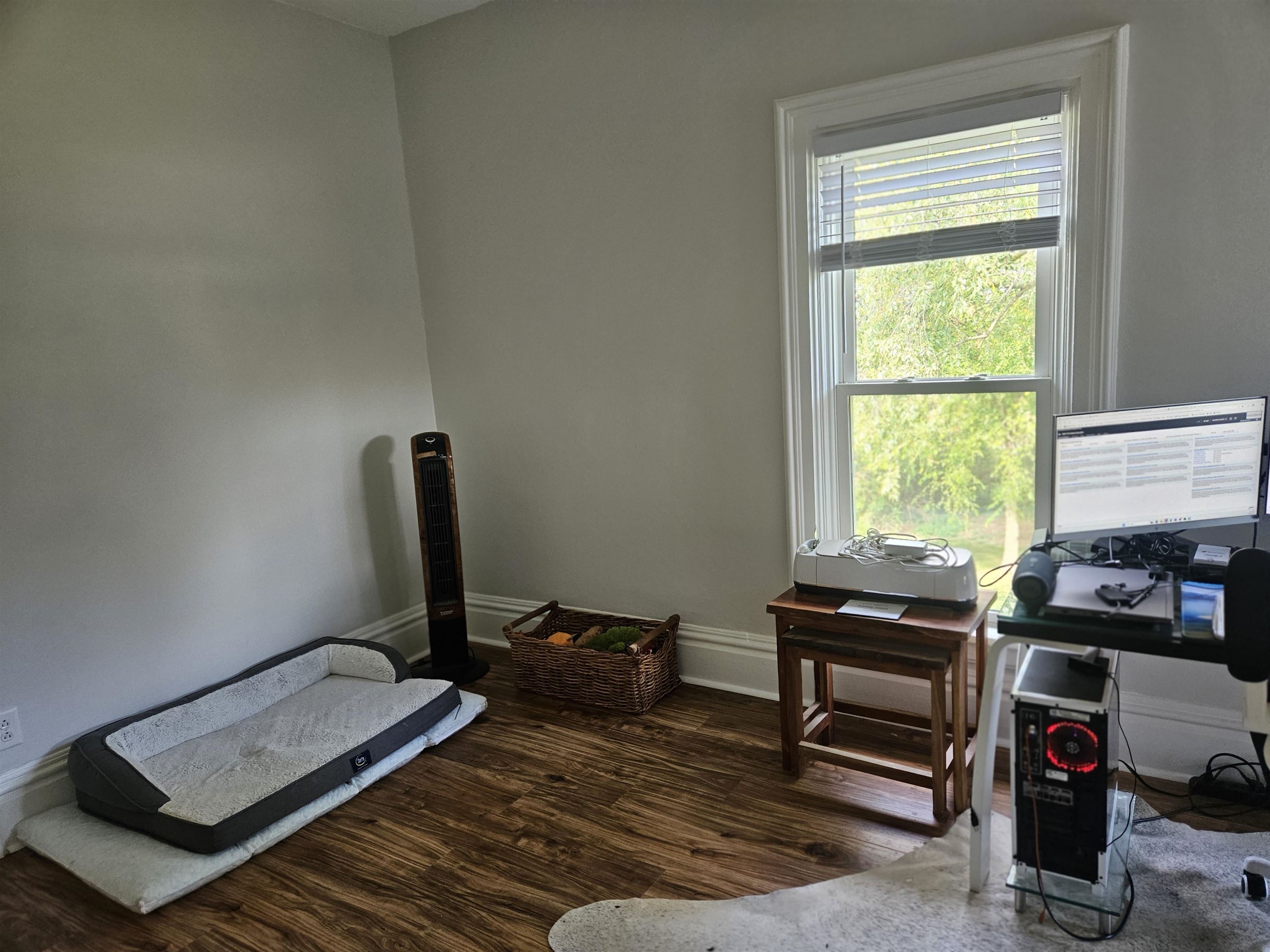 1851 West Winneshiek Road Freeport, IL 61032 - Photo 25 of 41 a room with furniture and a window