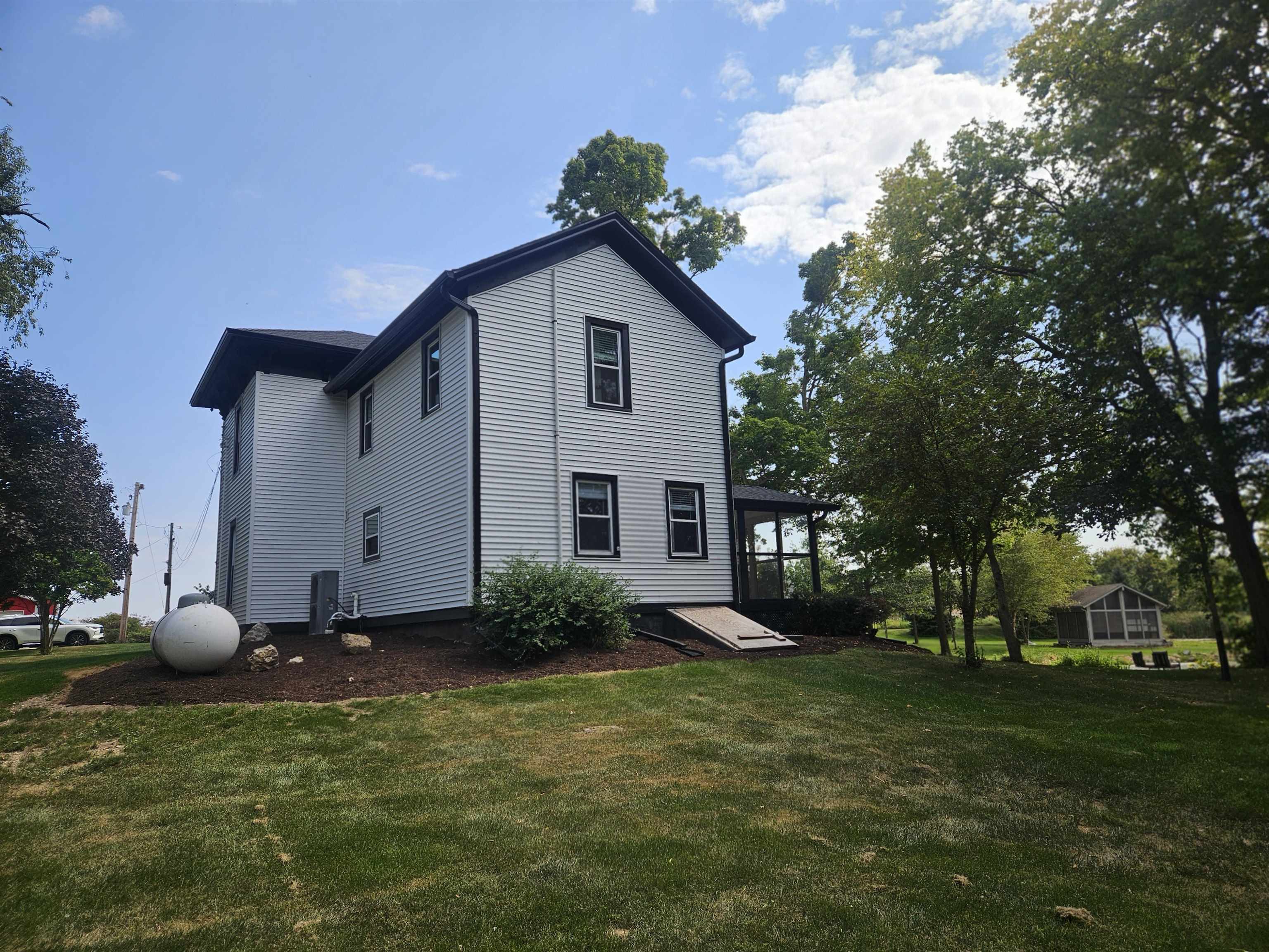 1851 West Winneshiek Road Freeport, IL 61032 - Photo 30 of 41 a house view with a garden space