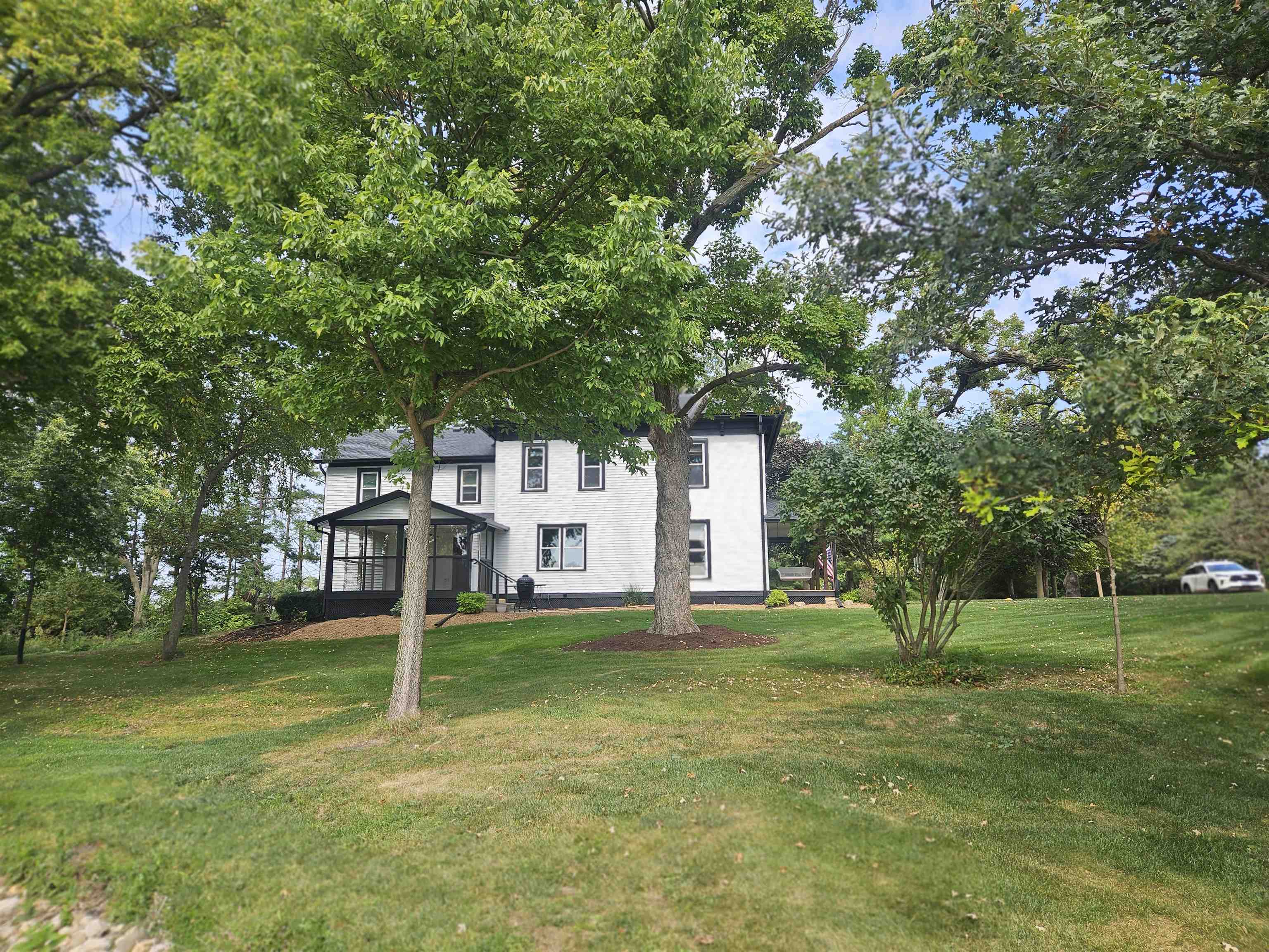1851 West Winneshiek Road Freeport, IL 61032 - Photo 31 of 41 a view of a house with a yard