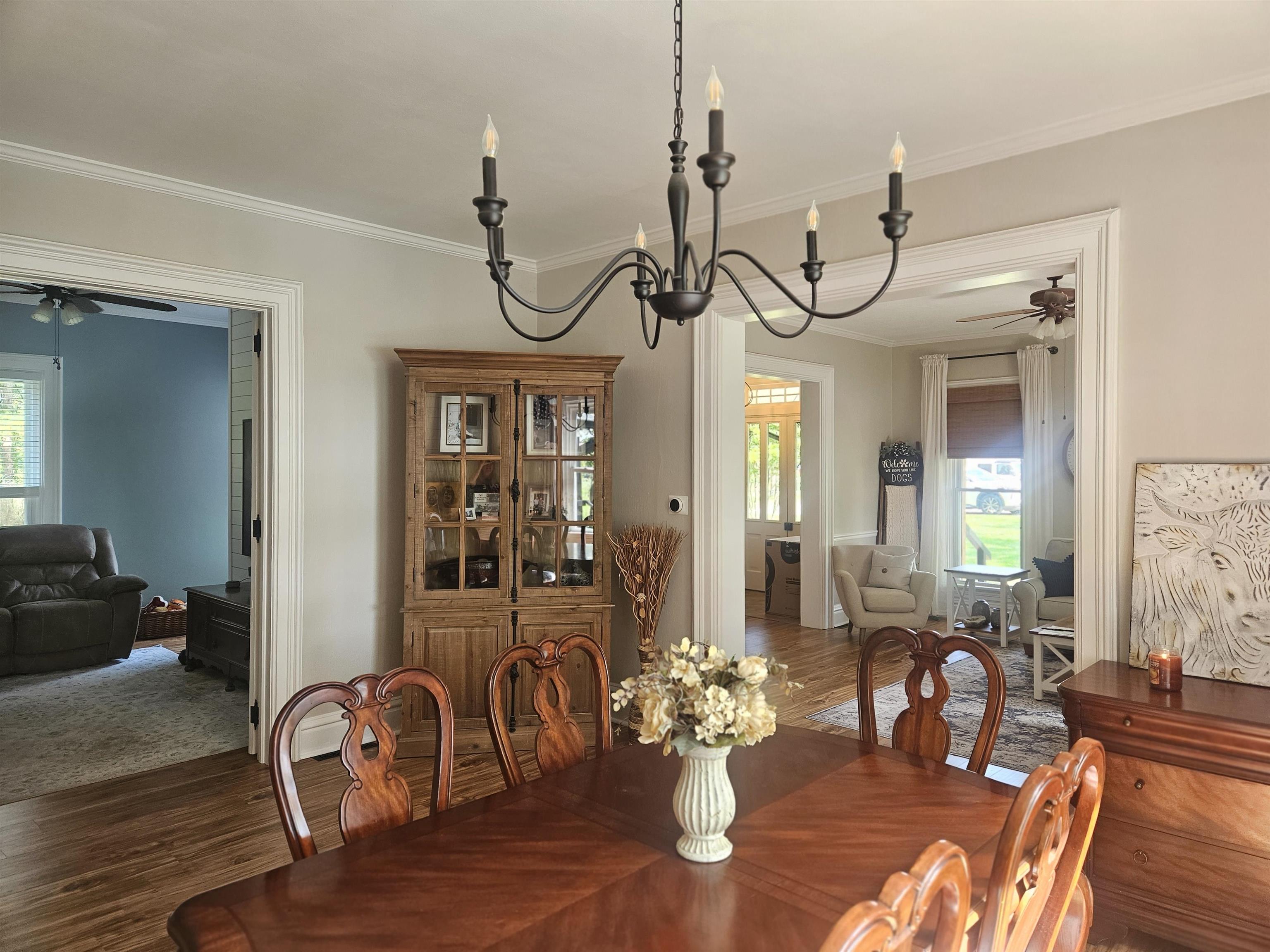 1851 West Winneshiek Road Freeport, IL 61032 - Photo 10 of 41 a view of a dining room with furniture window and wooden floor