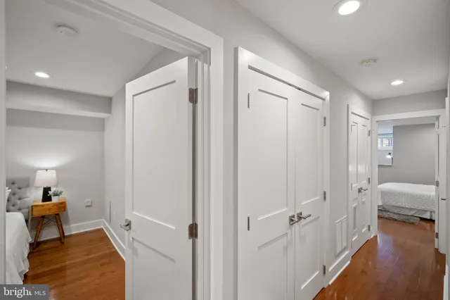 a view of a bedroom from a hallway